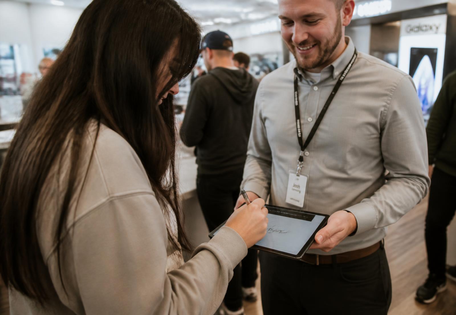 A candidate reviewing an offer summary with a recruiter
